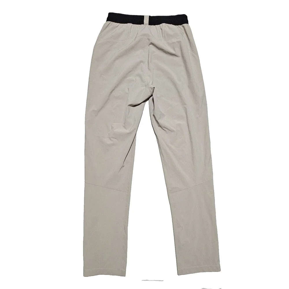 The North Face Essential Pant Mens S Outdoor Stretch TNF Running Zip Ankle Beige
